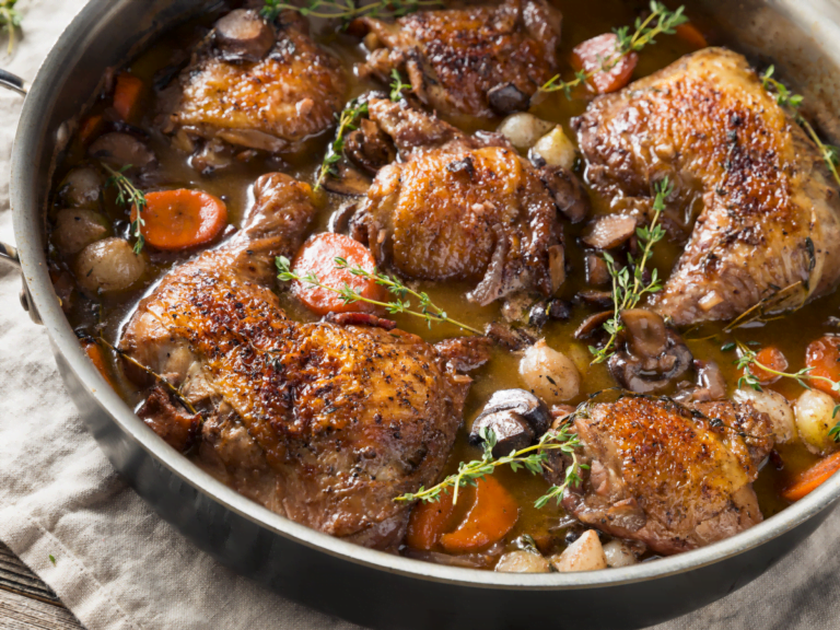 Classic Coq au Vin with chicken, mushrooms, and bacon