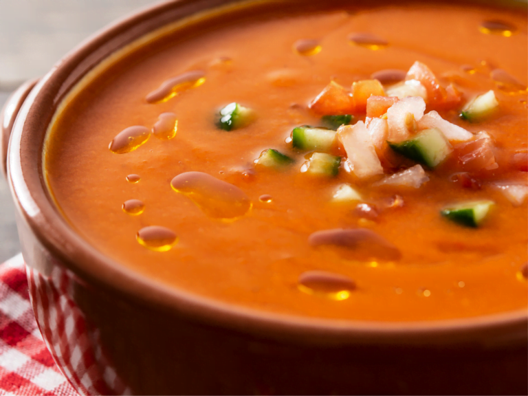 Classic Spanish gazpacho with ripe tomatoes, cucumbers, bell peppers, and onions
