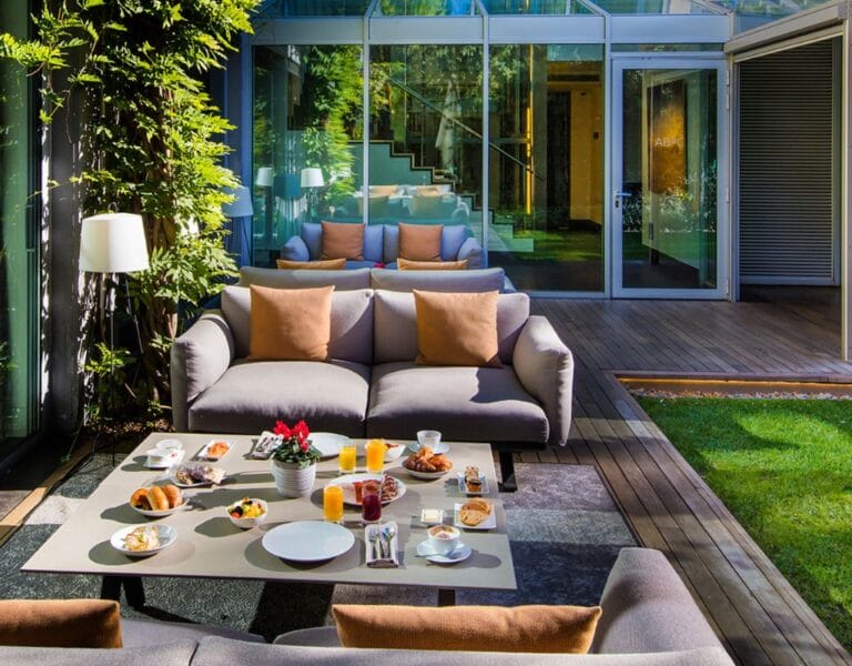 Tranquil terrace dining at ABaC Restaurant & Hotel in Barcelona