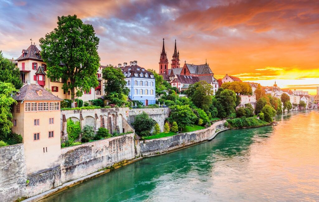 cenic view of a Basel Rhine river cruise with the city in the background.