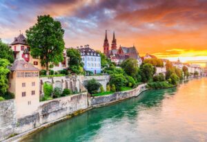 cenic view of a Basel Rhine river cruise with the city in the background.