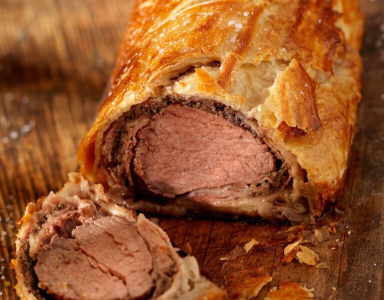 Classic Beef Wellington with tender beef fillet, mushroom duxelles, and puff pastry