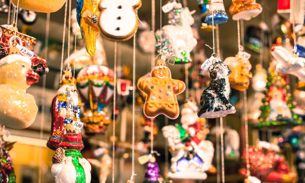 Assortment of traditional Christmas pastries and cookies displayed at a European Christmas market.