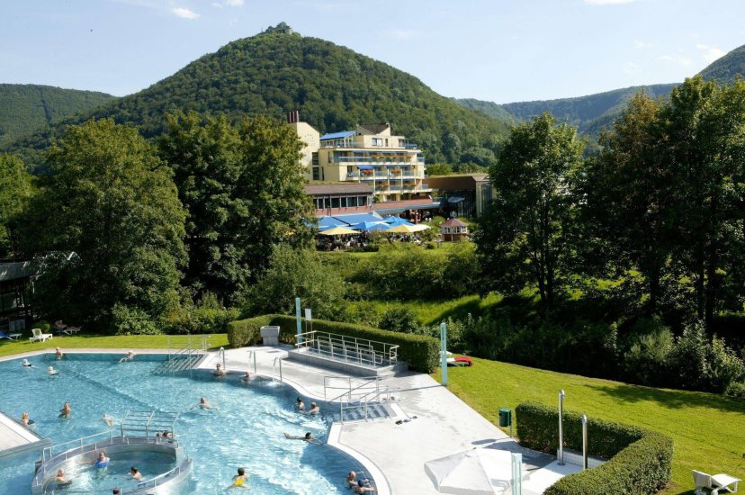 Hotel Graf Eberhard Exterior with Pool and Scenic Hilly Landscape