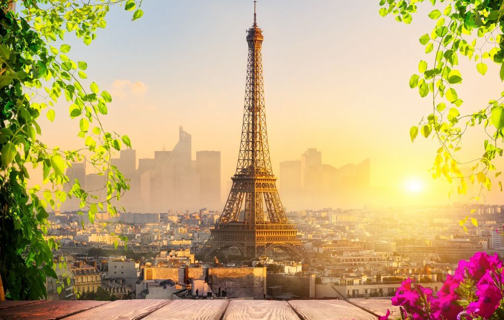 Eiffel Tower silhouette against a setting sun in Paris, France