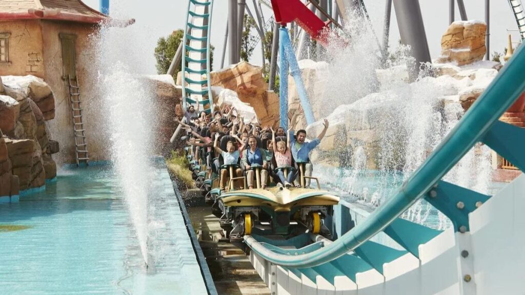 Child on a roller coaster at PortAventura, a Barcelona theme park.