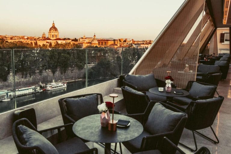 Terrace of The First Musica hotel with a view of Rome at night