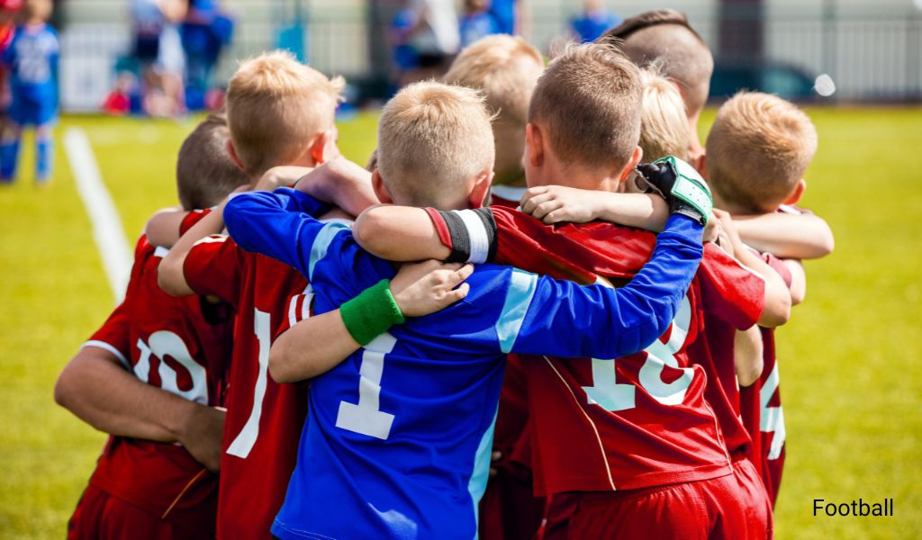 Children celebrating victory after a soccer match at Wiesbaden Army Base