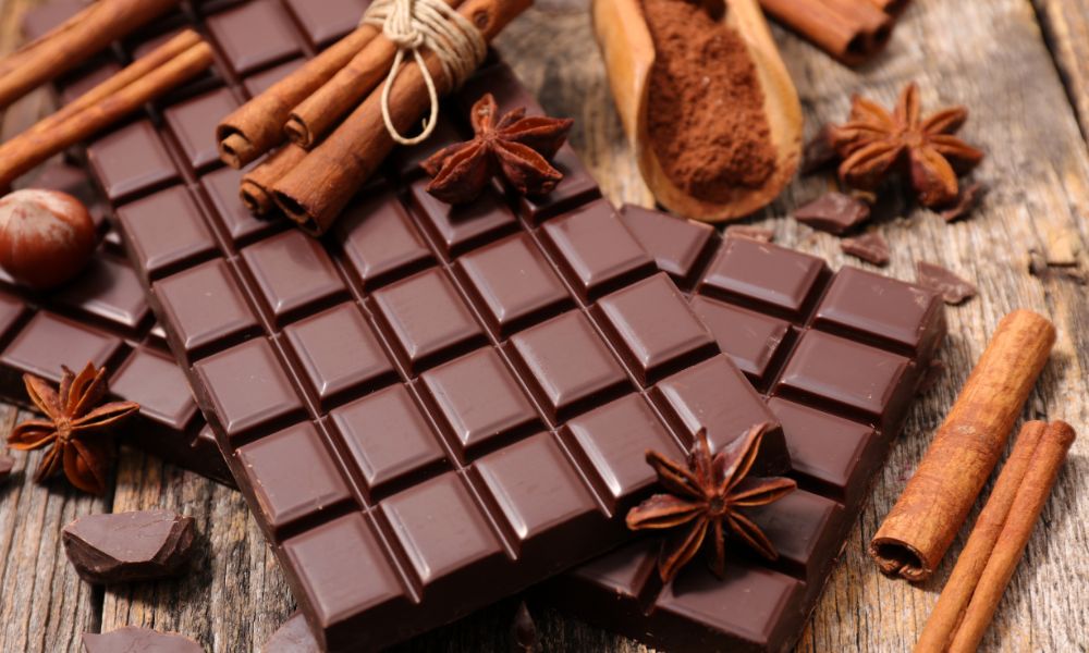 Close-up of a variety of artisanal chocolates with different flavors and textures.