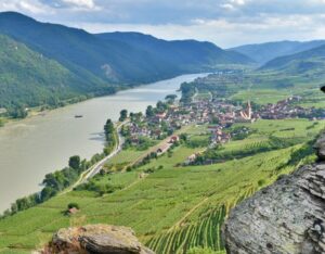 Panoramic view of Wachau Valley with terraced vineyards and the Danube River