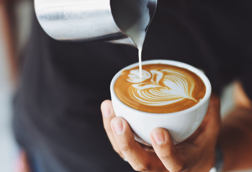 A steaming cup of coffee in a traditional Viennese café, representing the rich coffee culture in Vienna.