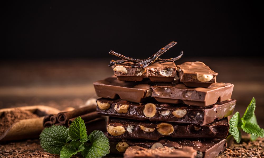 Close-up of a variety of artisanal chocolates with different flavors and textures.