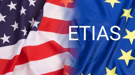 Flags of the United States and European Union representing ETIAS visa requirements for US travelers to Europe