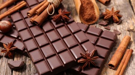 Close-up of a variety of artisanal chocolates with different flavors and textures.