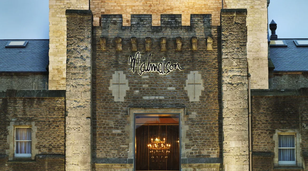Exterior view of Malmaison Oxford Castle, a historic hotel located in a castle setting.
