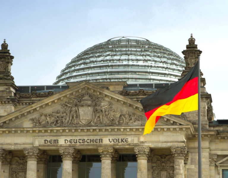 Reichstag dome with the German flag, symbolizing German culture