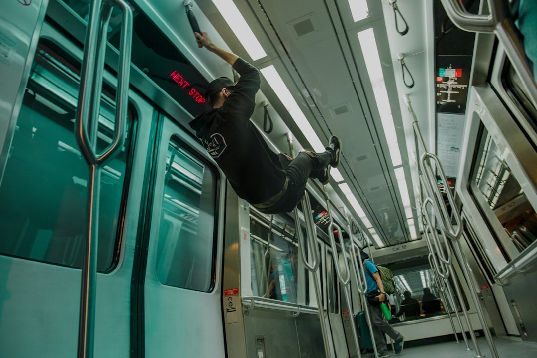 Man flying through a subway carriage in a photo collage