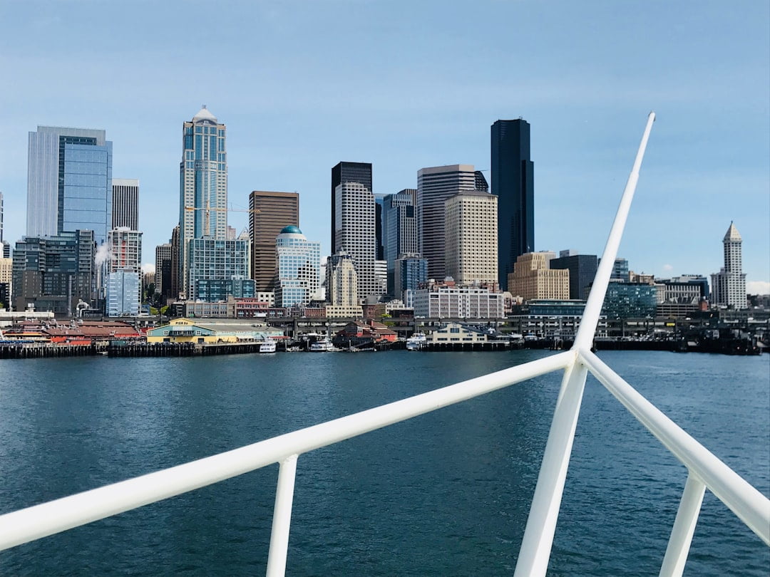 City skyline along a river, illustrating cultural contrasts in time and punctuality between Americans and Spaniards