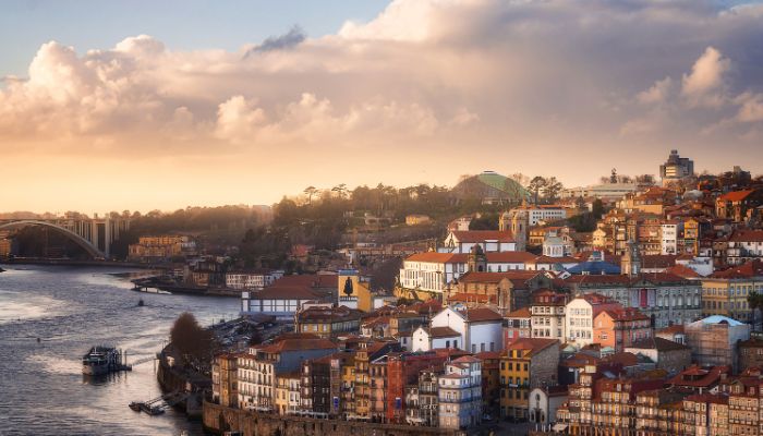 The historic Ribeira district of Porto, Portugal, is known for its colorful buildings along the Douro River.