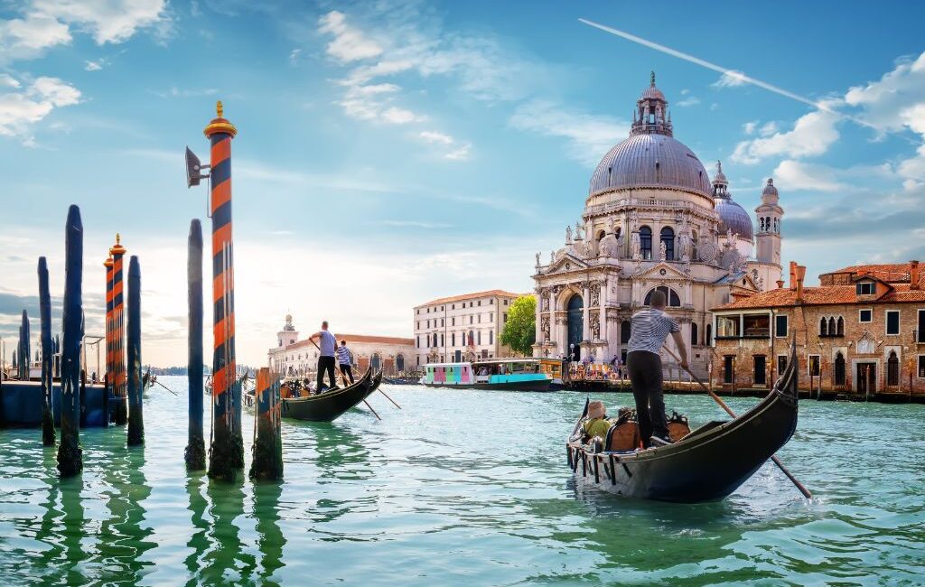 View of the Port of Venice with cruise ships and historic buildings in the background