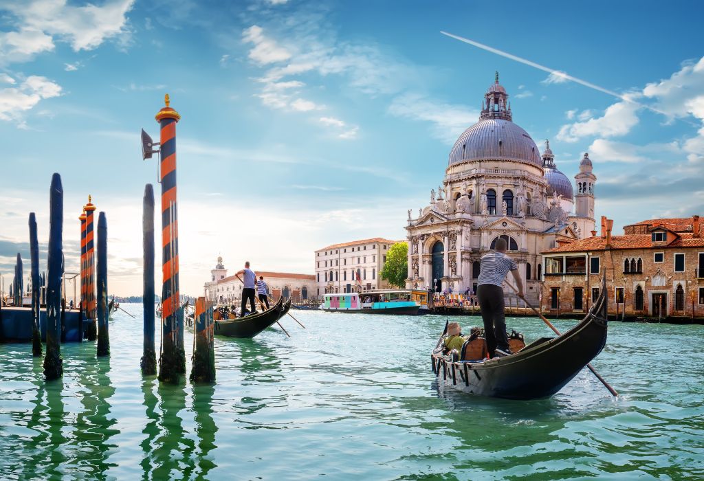 View of the Port of Venice with cruise ships and historic buildings in the background